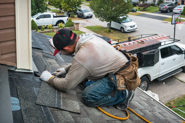 Professional Roofing technician working in Lawrence, NY